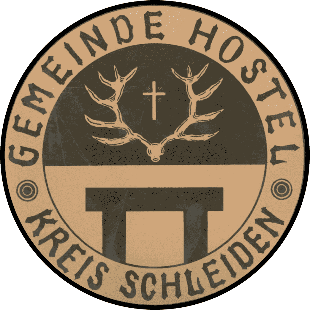 Rundes Gemeindesiegel mit der Umschrift Gemeinde Hostel – Kreis Schleiden, darin oben ein Hirschgeweih und unten ein Gerichtstisch
